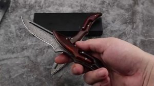 Складной нож с необычным дизайном ножи из дамасской стали.