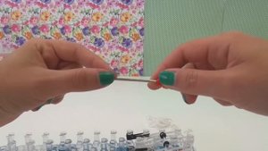 Брелок из резинок мордашка панды на станке Rainbow Loom
