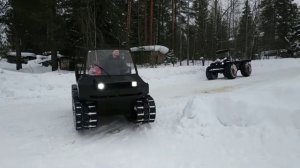 Тест драйв гусеничного и колёсного болотоходы по снегу