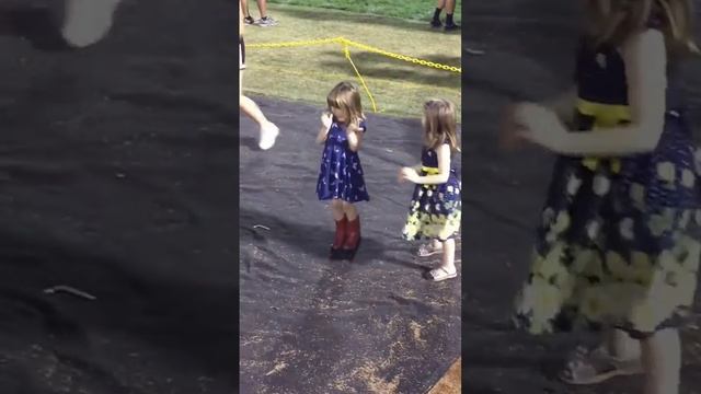 The Twins cheering at brothers game