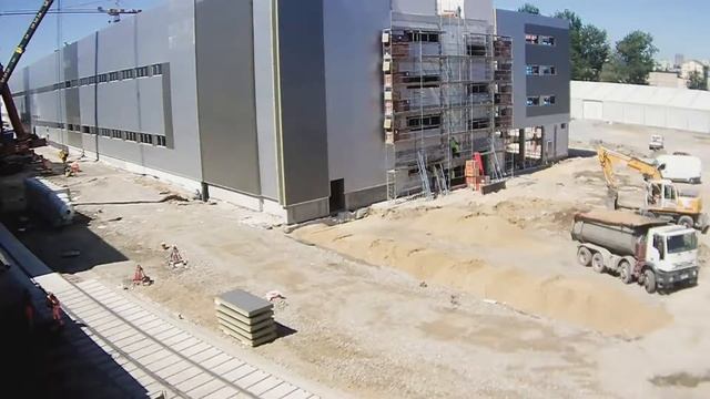 Lubella - Budowa Hali Produkcyjno-Magazynowej - TimeLapse Nad dachami смотреть онлайн