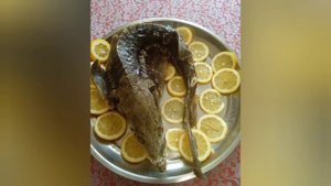 осётр запечённый в духовке целиком.