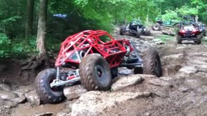 Custom Rock Crawler Buggy Tearing Up A Creek Bed
