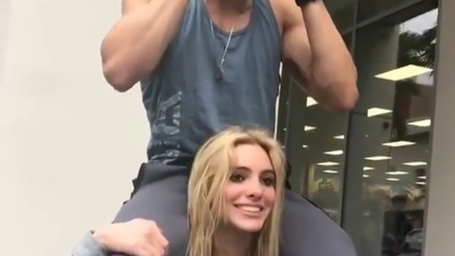 Beautiful blonde teen publically squats her 80kg boyfriend - lift carry