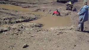 Girl stuck in mud
