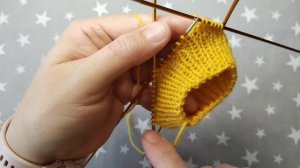 Поднятие петель из стенки пятки в носке.