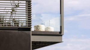 Modern House Design Surrounded By Lush Vegetation & Offers Breathtaking Views Of The Sea