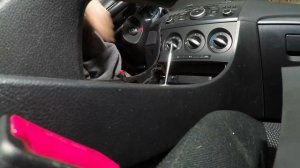 How to remove center console Mazda 3