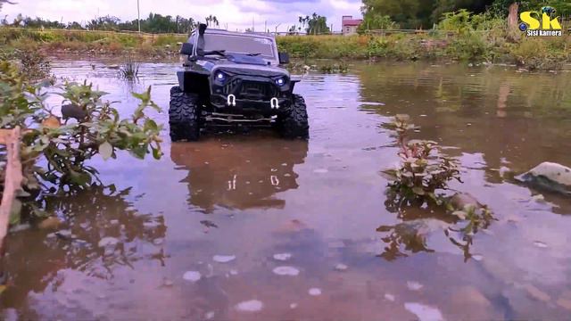 Rc Offroad 4x4 Jeep Rubicon Scale 1/10 Rgt 86100 V2 || water puddle test exceeds machine limit смотреть онлайн