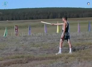 Соревнования по северным видам спорта: метание топора, 2000 год.