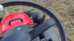 Процесс фрезерования почвы МТЗ 152