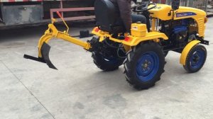 Однокорпусный плуг на минитракторе "ФАЙТЕР Т-12"