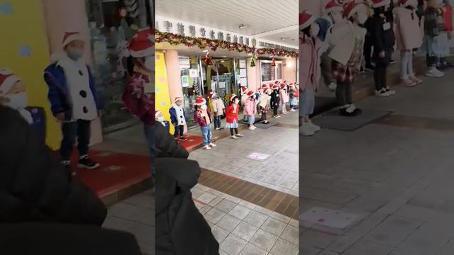 Chinese kids singing merry Christmas..