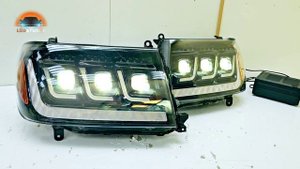 Toyota Land Cruiser 100 тюнинг комплект светодиодных фар. Три Bi led  на фару в тёплом свечении!
