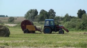 МТЗ 80  с рулонным пресс подборщиком ППР-Ф-180.