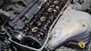 Toyota Voxy двигатель 1az Fe д 4 замена цепи ГРМ