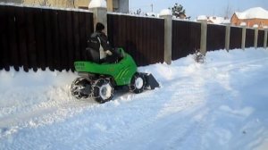 чистка снега мини погрузчиком авант 220