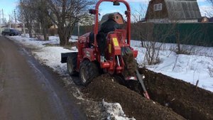 Копка траншей траншеекопателем DITCH WITCH RT45