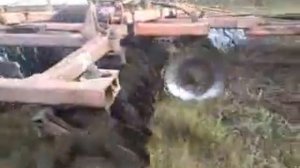 Трактор ХТЗ Т-150К с бороной дисковой тяжелой БДТ-7.