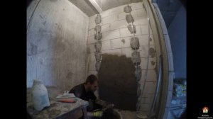 Цементная штукатурка по маякам в ванной комнате