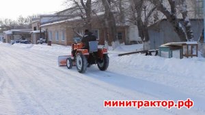 Уборка снега - минитрактор Уралец - передний отвал