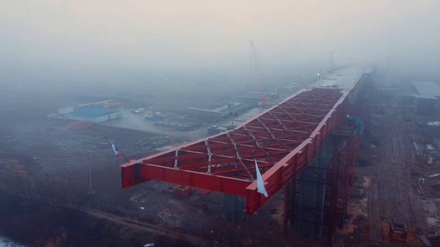 Надвижка пролётов нового моста через ВДСК в Волгограде