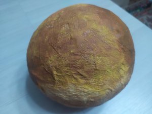 Планета Венера в технике папье-маше.