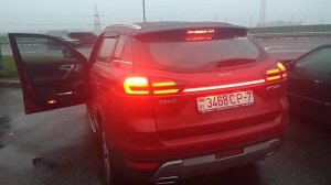 Geely Atlas - Замена задней хром накладки на LED- СТОПак.