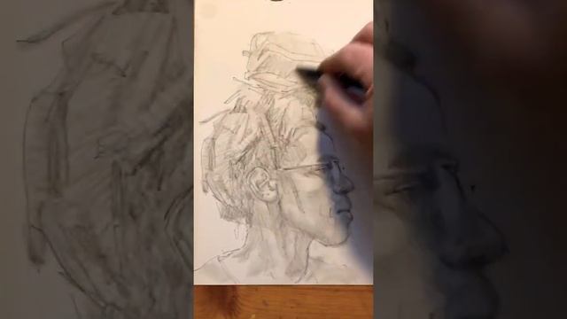 Timelapse graphite pencil portrait sketch of Khalil