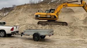 Toyota Hilux truck is a sand transporter.