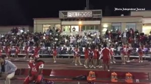 San Rafael football fans cheer on their team during the Bulldogs' game against Terra Linda Friday n