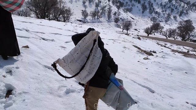 Heavy snowfall and help of Narges to the sick child of Nazanin a nomadic woman