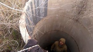 Спасение кота из канализационного колодца