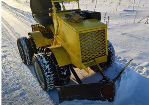 чистка отвалом бабочка на мини тракторе без гидравлики