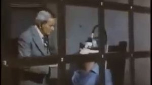 Ronald F. Carrey in electric chair.