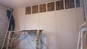 devorni gipsokarton bilan qoplash. обшевать стен с гипсокартоном. covering the wall with drywall