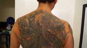 Testing  Sony Alpha A37 with older tattoo on tanned skin