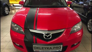 Спортивные полосы на автомобиль  оклейка в Москве