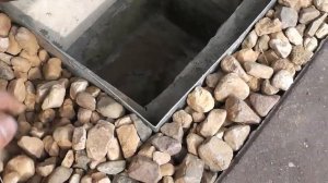 Ливневая канализация. Приемный колодец, укладка трубы в траншее, общий вид.