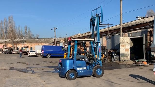 Бензиновый вилочный автопогрузчик TCM FHG25N5 с полукабиной и печкой