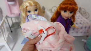 Elsa and Anna toddlers Packing for Vacation Disney Princess