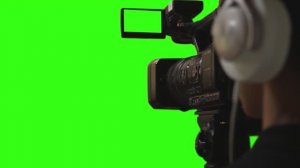 Футаж на зеленом фоне в Full HD. Хромакей. Оператор с камерой на зеленом фоне. Видео-Переходы.