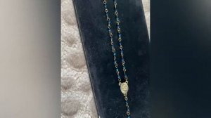 Старинная цепочка с кулоном и крестиком