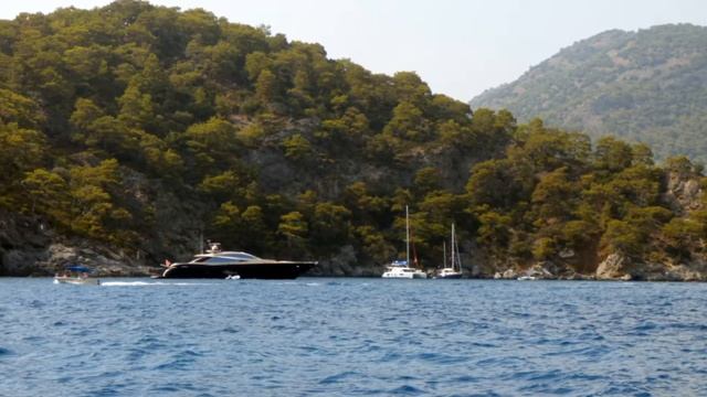Пляж  и острова  Олюдениз (Oludeniz), гора Бабадаг.