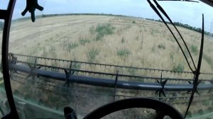 Уборка роторным комбайном John Deere S780 грязного рапса (с зеленкой)