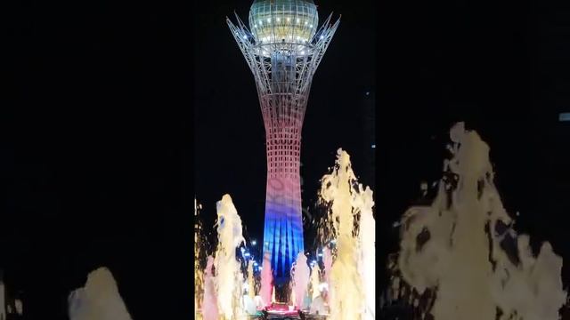 Vertical video. Baiterek - The central point of interest of the new Astana, in the light of night l