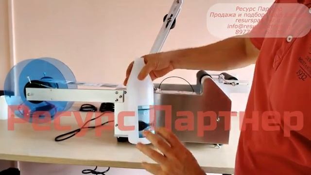 Этикетировочная машина (этикетировщик) для круглой тары .