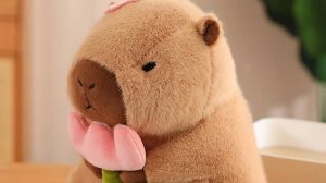Игрушка капибара с цветочком 30 см