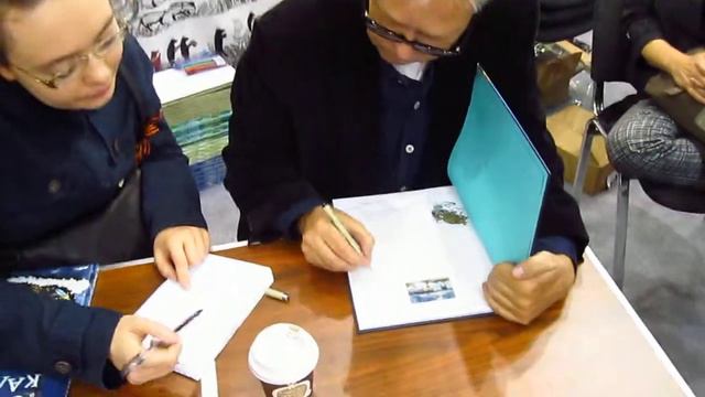 Маури Куннас - автограф в книге (рисунок) смотреть онлайн