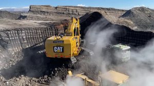 Caterpillar 6015B Excavator Loading Mercedes & MAN Trucks With Two Passes - Sotiriadis Mining Works